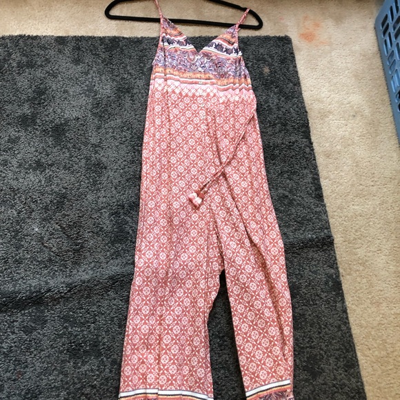 This jumpsuit has never been worn before, brand new still has the price tag - Picture 3 of 5